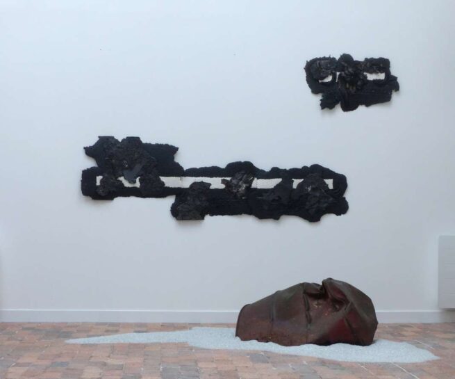 metal sculptures on an exhibition setting