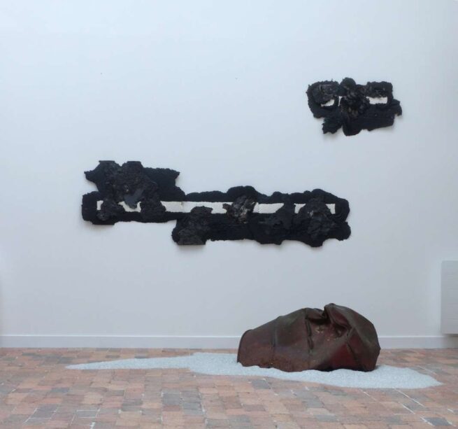 metal sculptures on an exhibition setting