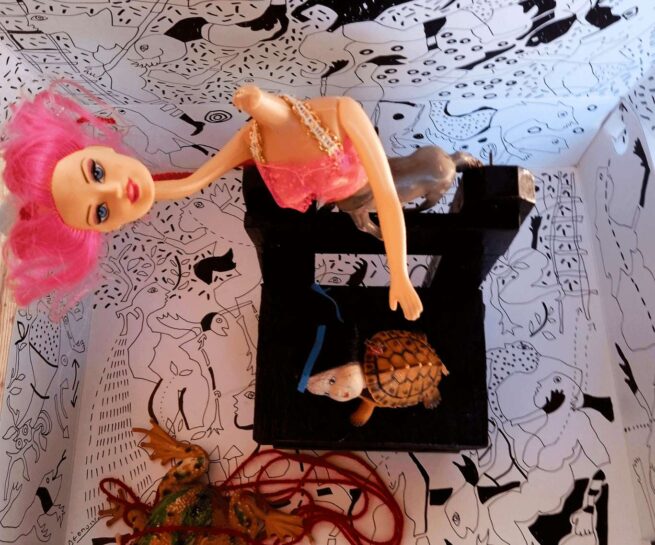 A doll that holding their head