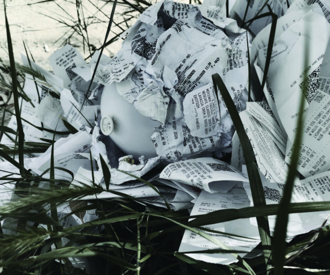 A ballon that had many receipts on top