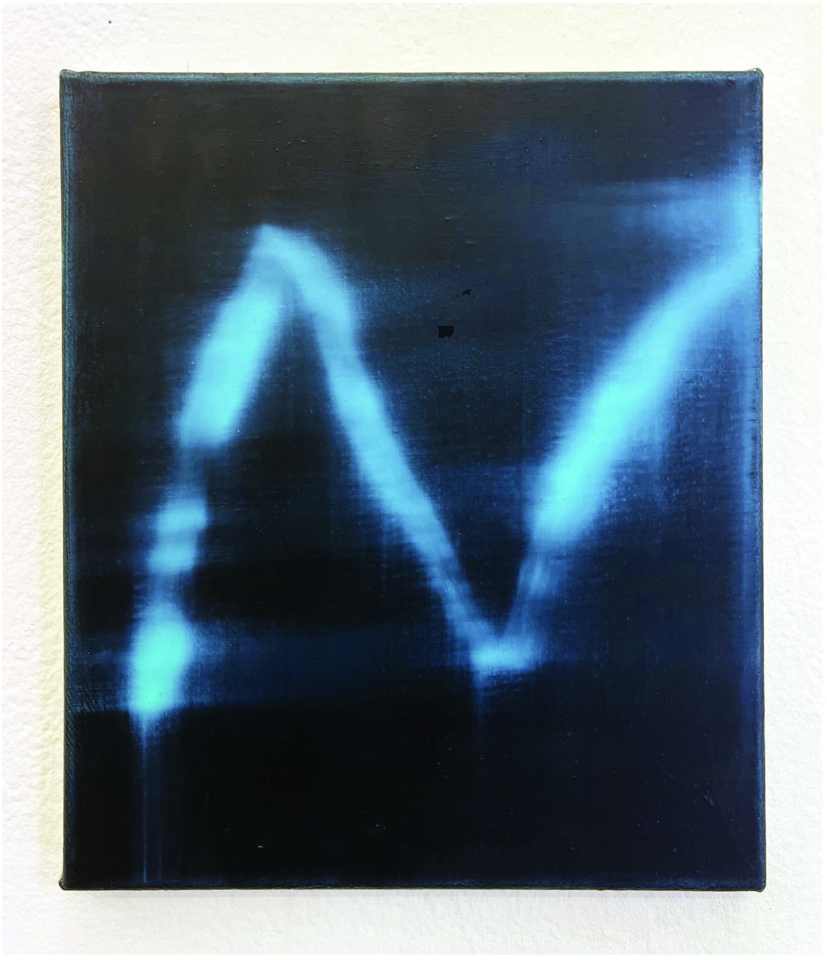 abstract long exposure photograph. Black background and blue colour shape