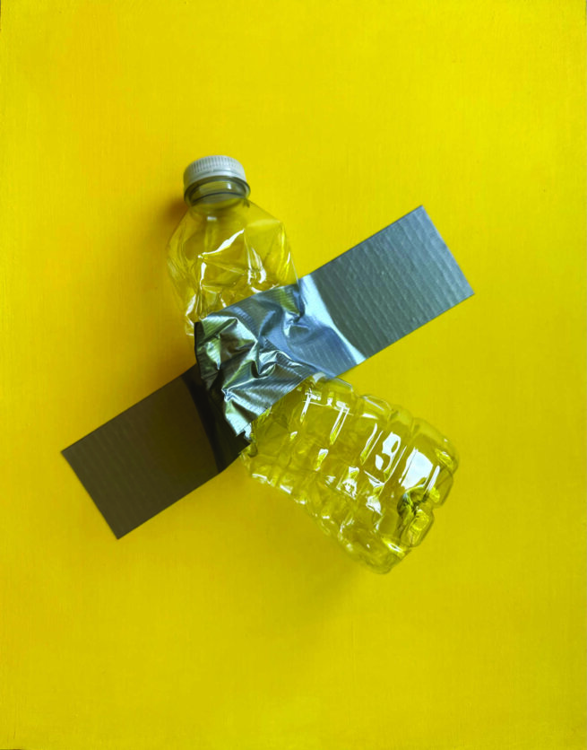 A water bottle taped with a grey gaffer tape on a yellow wall