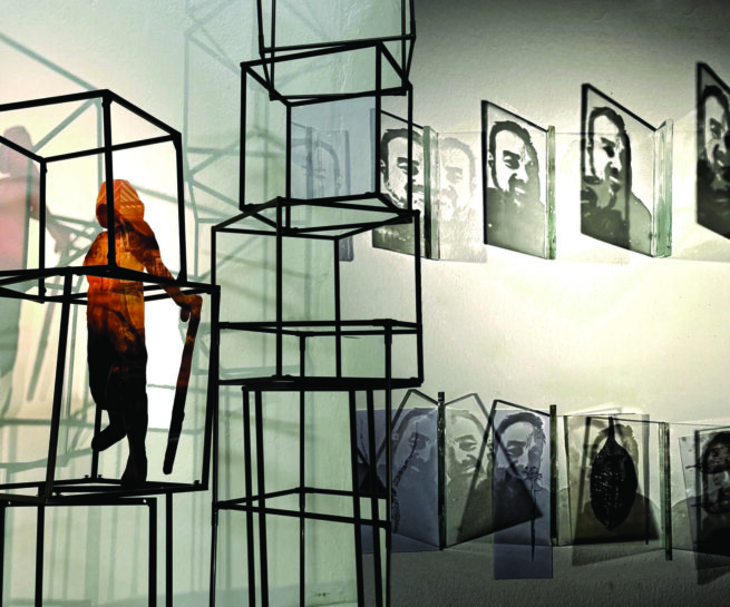 Art installation composed with framed boxes on top of each other