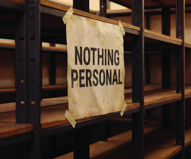 a shelve with a print message "nothing personal"