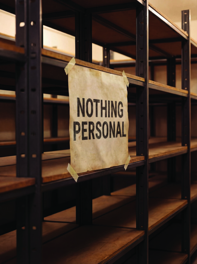 a shelve with a print message "nothing personal"