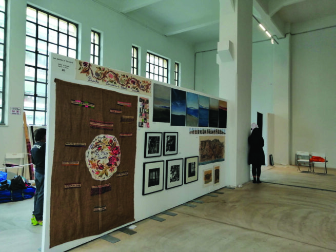 exhibition showing paintings and photographs