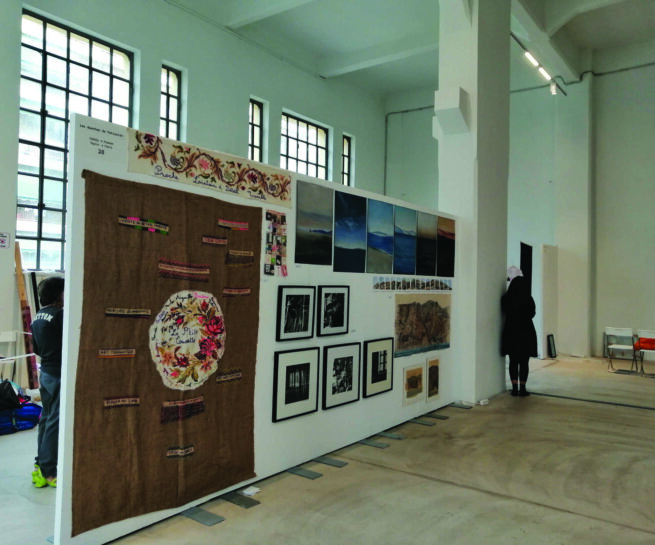 exhibition showing paintings and photographs